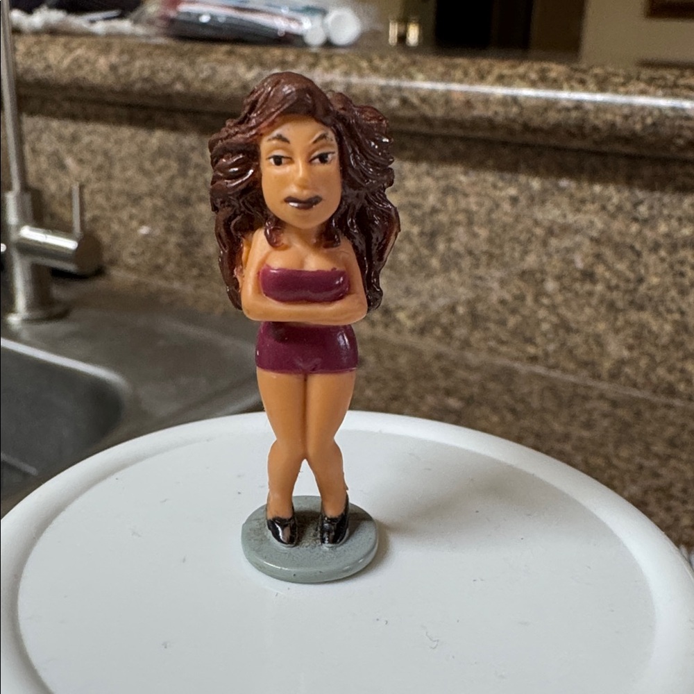 The product is a "Shorty" figurine from the Lil' Homies toy line, specifically